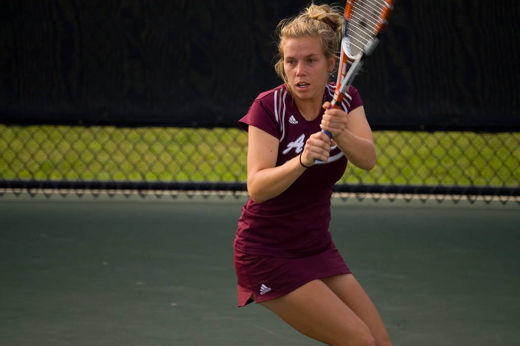 Women's tennis match in progress at Ace Courts
